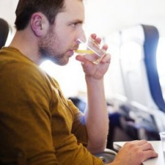 7 Drinks You Should Never Order on a Plane