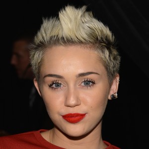 Miley Cyrus Reacts to Incriminating Photo