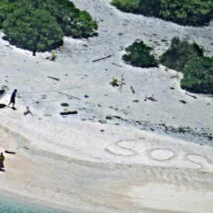 Castaways Rescued After Writing Out Enormous 'SOS' In The Sand - ZergNet