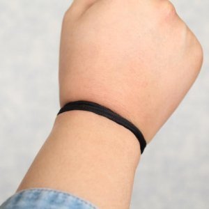 Why You Should Probably Stop Wearing Hair Ties Around Your Wrist
