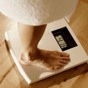 Image of a woman eating a burger