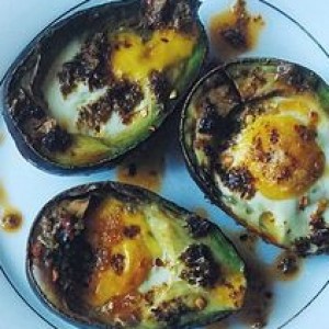 Why You Should Bake Your Eggs Inside An Avocado