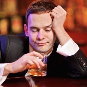 How to Pull Off Drinking Alone at a Bar