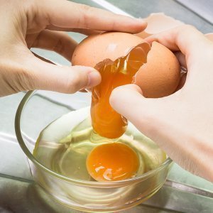 Why Cracking An Egg On The Side Of A Bowl Is A Terrible Idea