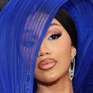 Cardi B Turns Heads In Cutout Blue Gown At The Grammy Awards - ZergNet