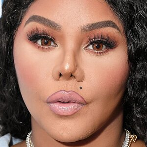Lil Kim Rocks Sheer Black Jumpsuit As She Heads To Grammys Party