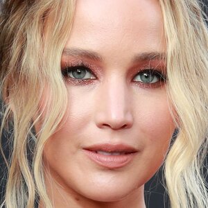 Jennifer Lawrence Wows In Skirt & Thigh-High Boots On Date Night