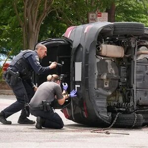 Rumors Fly After Cops Pull Bullet-Riddled Car & Bodies From Lake