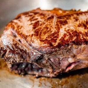 Sneaky Ways Steakhouses Add Flavor Bombs To Their Cuts