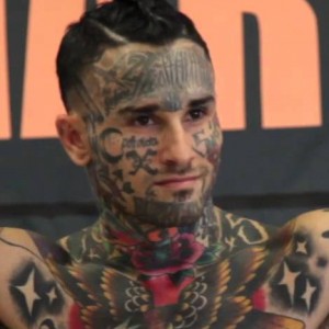 Tattooed MMA Fighter Acts Tough, Gets Knocked Out Instantly